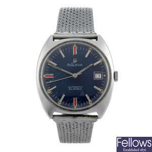 BULOVA - a gentleman's stainless steel bracelet watch with two Bulova watches.