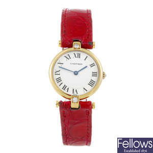 CARTIER - a factory diamond set yellow metal Vendome wrist watch.