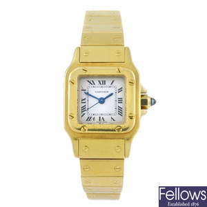 CARTIER - a yellow metal Santos bracelet watch.