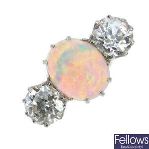 An opal and diamond three-stone ring.