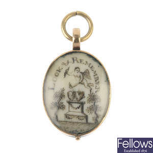 An early 19th century gold mourning pendant.