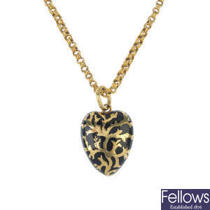 A mid Victorian gold black enamel pendant and chain. 