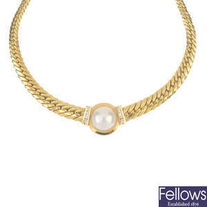 A mabe pearl and diamond collar.