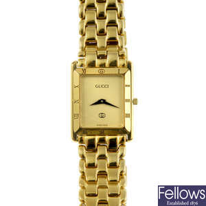 GUCCI - a gentleman's gold plated 4200M bracelet watch with a lady's Gucci 6000L wrist watch.
