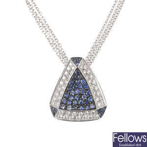 A sapphire and diamond pendant, with chain. 