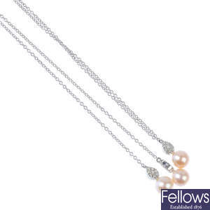 A cultured pearl and diamond lariat.