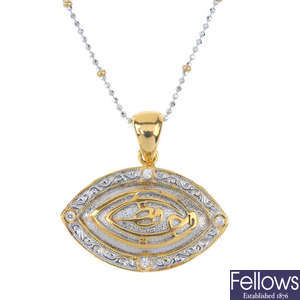 A marquise shape bi metal pendant and chain.