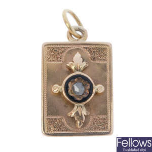 A late Victorian gold diamond and enamel memorial charm/pendant.