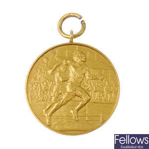 A 1950s 9ct gold 'Jedburgh Border Games' medal.