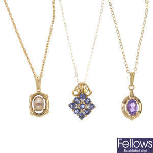 A selection of six gem-set pendants, with chains.