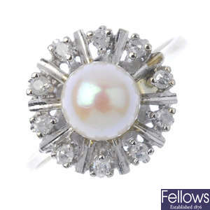 A cultured pearl and diamond cluster ring. 
