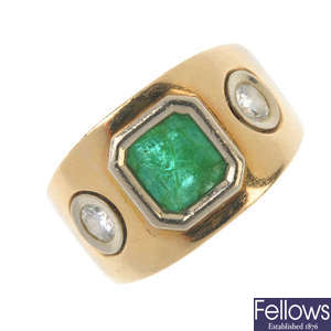A gentleman's emerald and diamond dress ring.