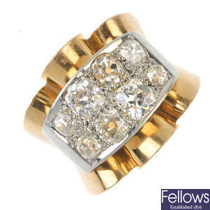 A mid 20th century gold and platinum diamond dress ring. 