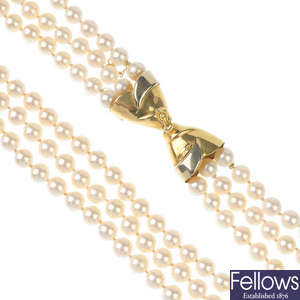 A cultured pearl three-row necklace. 