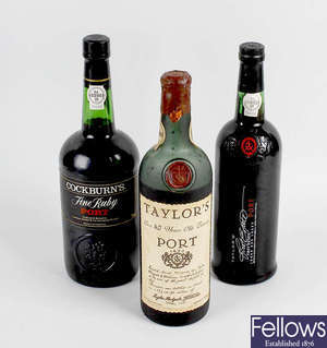 A box containing a mixed selection of port