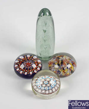 A group of four paperweights