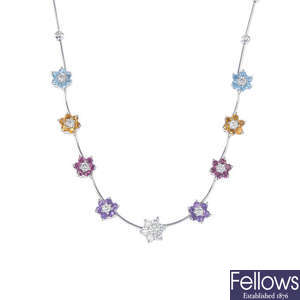 A diamond, amethyst, garnet, citrine and topaz flower necklace. 