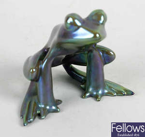 A small Zsolnay Pecs Eosin lustre pottery frog.