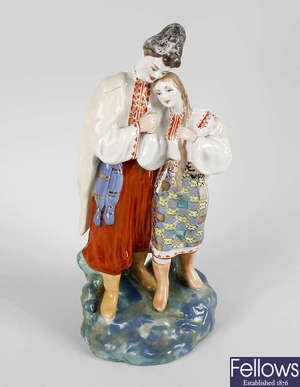 A Russian porcelain figure group. 
