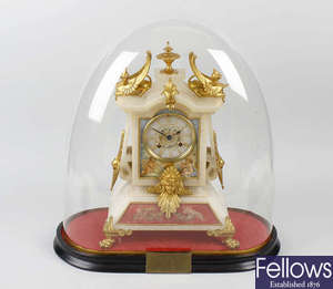 A 19th century French painted alabaster mantel clock