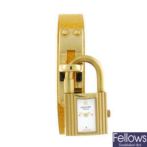 HERMES - a lady's gold plated Kelly wrist watch.