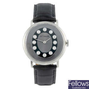 LECOULTRE - a gentleman's white metal wrist watch
