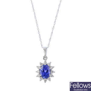 An 18ct gold tanzanite and diamond cluster pendant, with chain.
