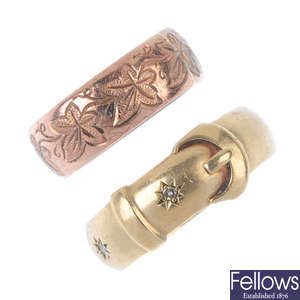 A band ring, together with a 9ct gold buckle ring. 