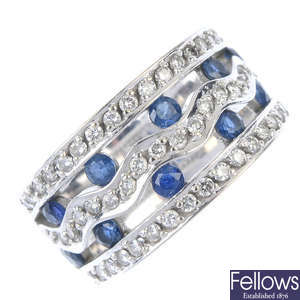 An 18ct gold sapphire and diamond dress ring. 