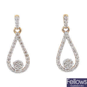 A 9ct gold diamond pendant and ear pendants. 