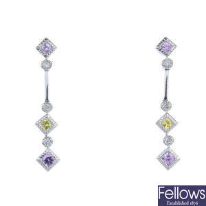 Two pairs of diamond ear pendants. 