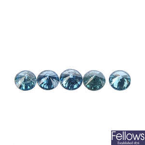A selection of brilliant-cut colour treated diamonds.