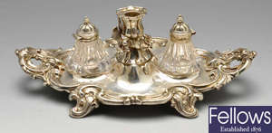 An early Victorian silver inkstand with two glass bottles. 