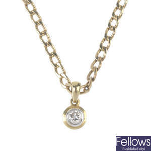 A diamond single-stone pendant and chain.