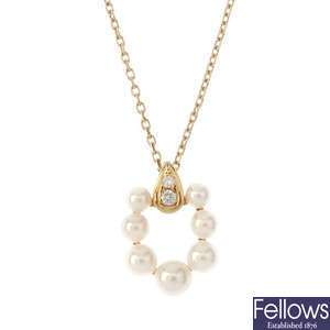 MIKIMOTO - a cultured pearl and diamond pendant, with chain.