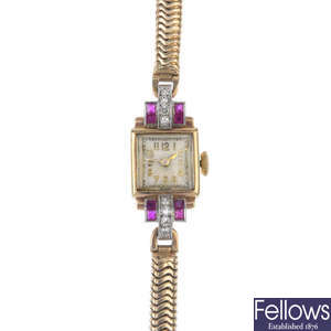 A mid 20th century 9ct gold diamond and gem-set cocktail watch.