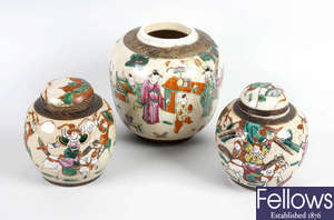 A box containing a mixed selection of nine assorted oriental pottery and porcelain ginger jars