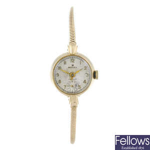 ROLEX - a lady's 9ct yellow gold Precision bracelet watch.