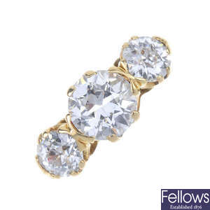 An 18ct gold diamond three-stone ring.