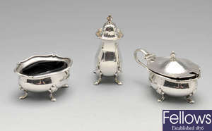 A matched silver condiment set, silver cup holder, silver spoons & a selection of silver plated items, etc.