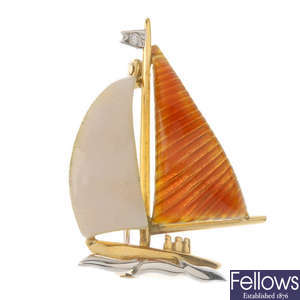 An enamel and diamond sailing boat brooch.