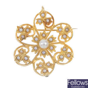 A 9ct gold split and cultured pearl openwork pendant.