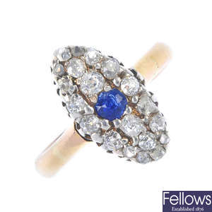 An early 20th century gold sapphire and diamond cluster ring.