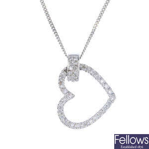 An 18ct gold diamond heart pendant and chain.