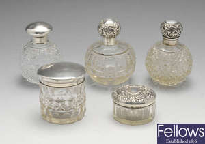 A selection of four various late Victorian silver mounted glass scent bottles and two vanity jars, etc. 