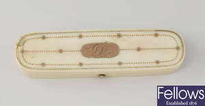 An early 19th century rose gold-inlaid ivory toothpick box