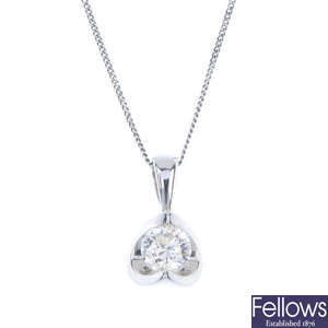 An 18ct gold diamond pendant, with chain. 
