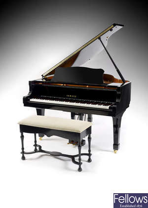 A Yamaha C1 Conservatoire baby grand piano