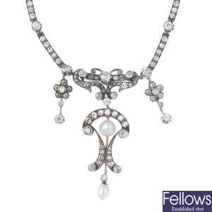 A diamond and cultured pearl necklace.