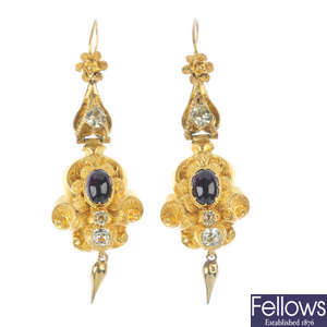 A pair of garnet and gem-set earrings.